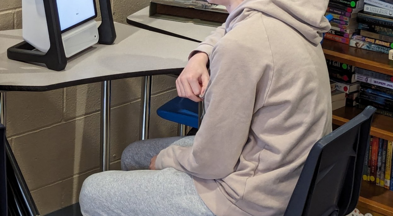 student working with M2 device