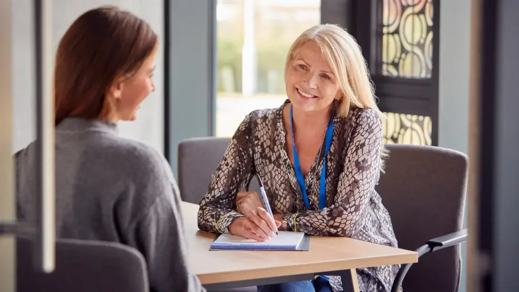 Principal providing feedback on instruction to a first-year teacher