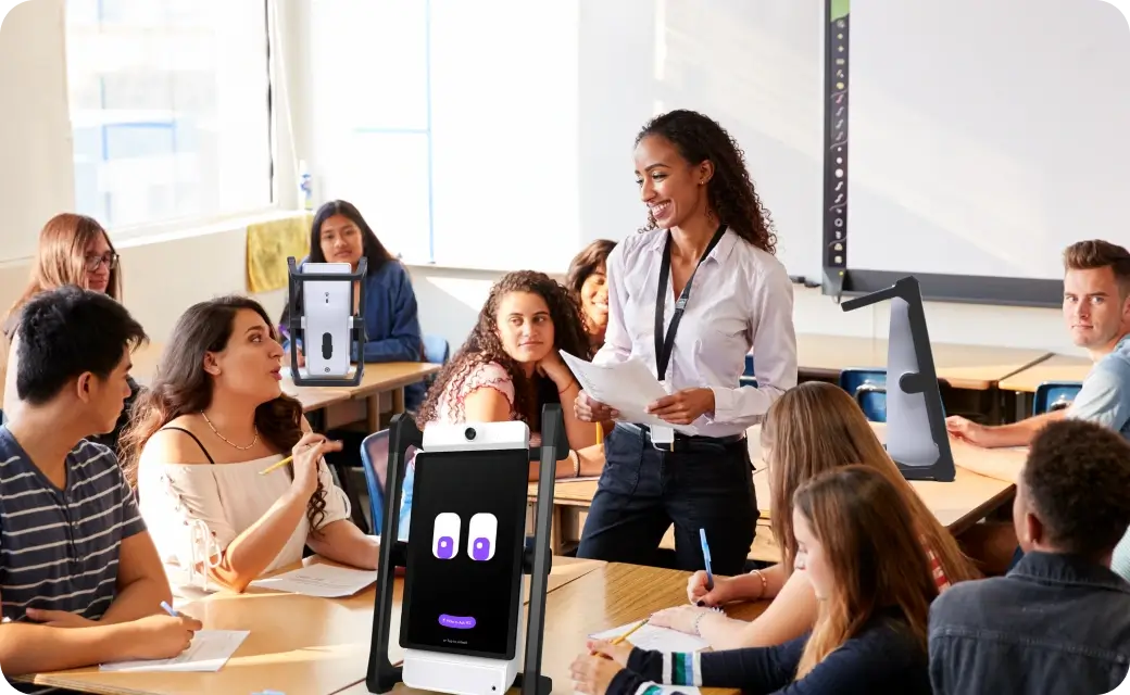 M2 device on the professor’s desk, co-teaching alongside the instructor in a university classroom.