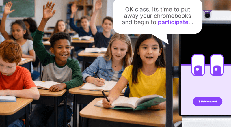 Students in a classroom actively participating with hands raised while a teacher prompts discussion, illustrating the M2 Score focus on classroom participation.